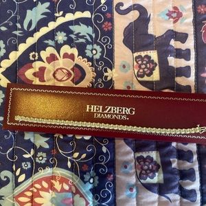 60 diamonds  3 ct. tw.,  10K white gold bracelet is a dazzling gift. 7 inches